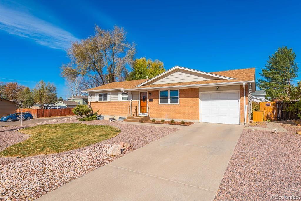 49 Calhoun Road Pueblo, CO 81001 - Photo 6 of 24 a front view of a house with a yard