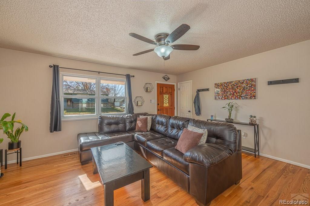 49 Calhoun Road Pueblo, CO 81001 - Photo 8 of 24 a living room with furniture and a window