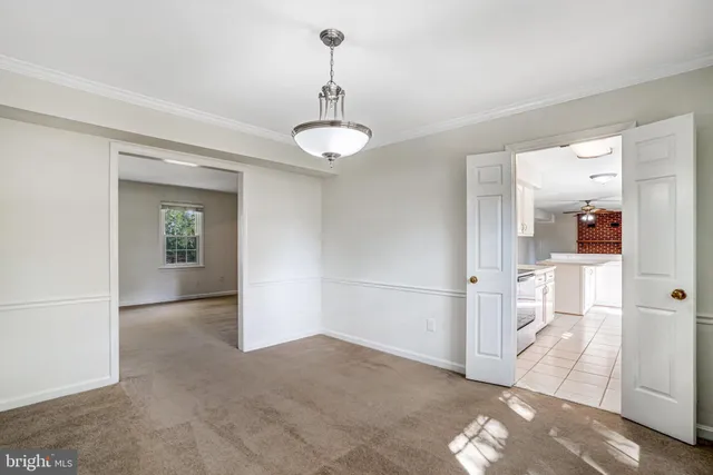 a kitchen with stainless steel appliances a refrigerator sink and cabinets
