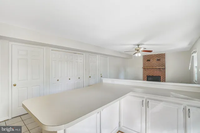 a view of a kitchen with a sink