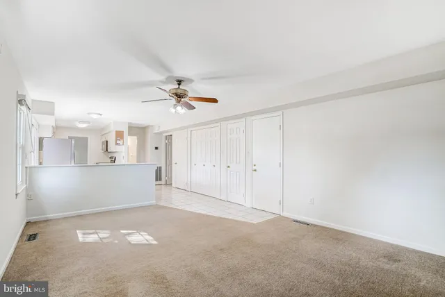 a bathroom with a sink toilet and a mirror