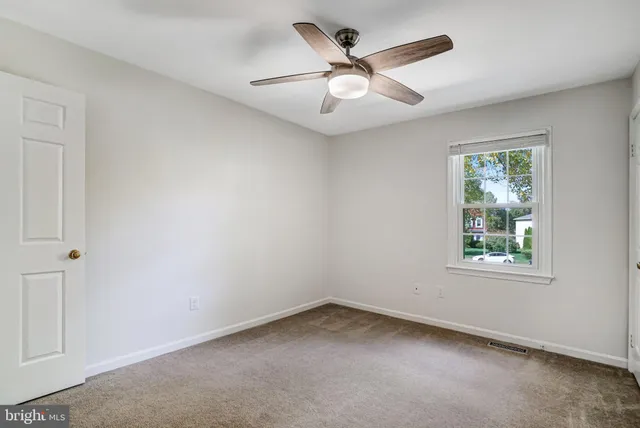 a bathroom with a sink and a window