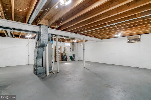 a view of a yard with large trees