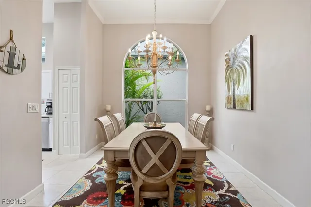 a kitchen with stainless steel appliances a stove a sink and cabinets