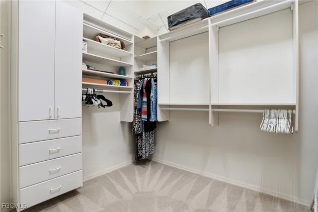 a view of a backyard with a swimming pool