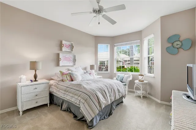 a view of a backyard with sitting area