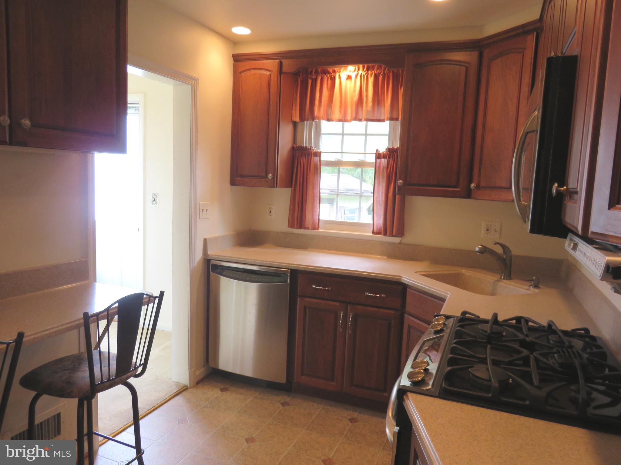 2441 Lakewood Road Baltimore, MD 21234 - Photo 3 of 21 UPDATED KITCHEN WITH BUILT-IN BREAKFAST TABLE