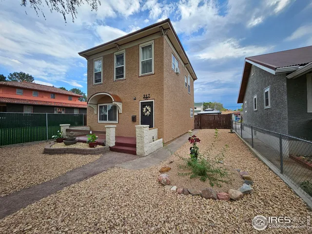 a view of a house with a patio