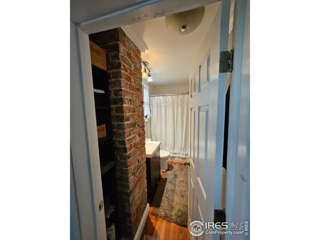 a work room with furniture and a window