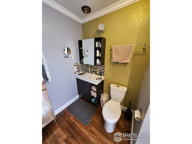 a bed room with furniture and a window