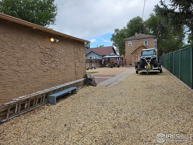 a view of a backyard of a house