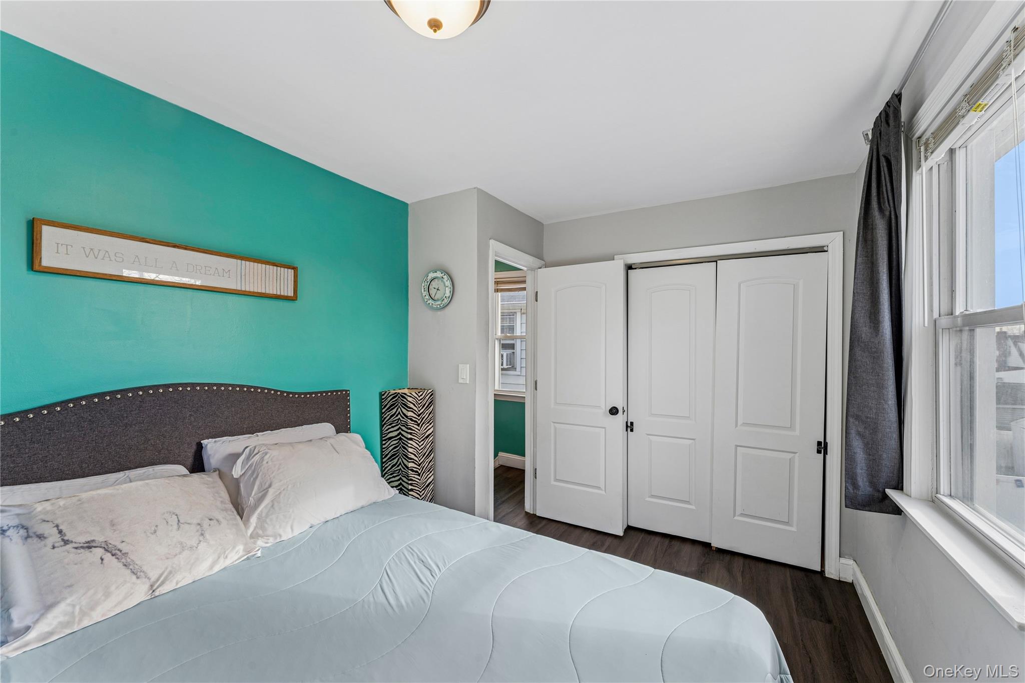 68 Putnam Avenue Valley Stream, NY 11580 - Photo 14 of 23 a bed room with a bed and a window