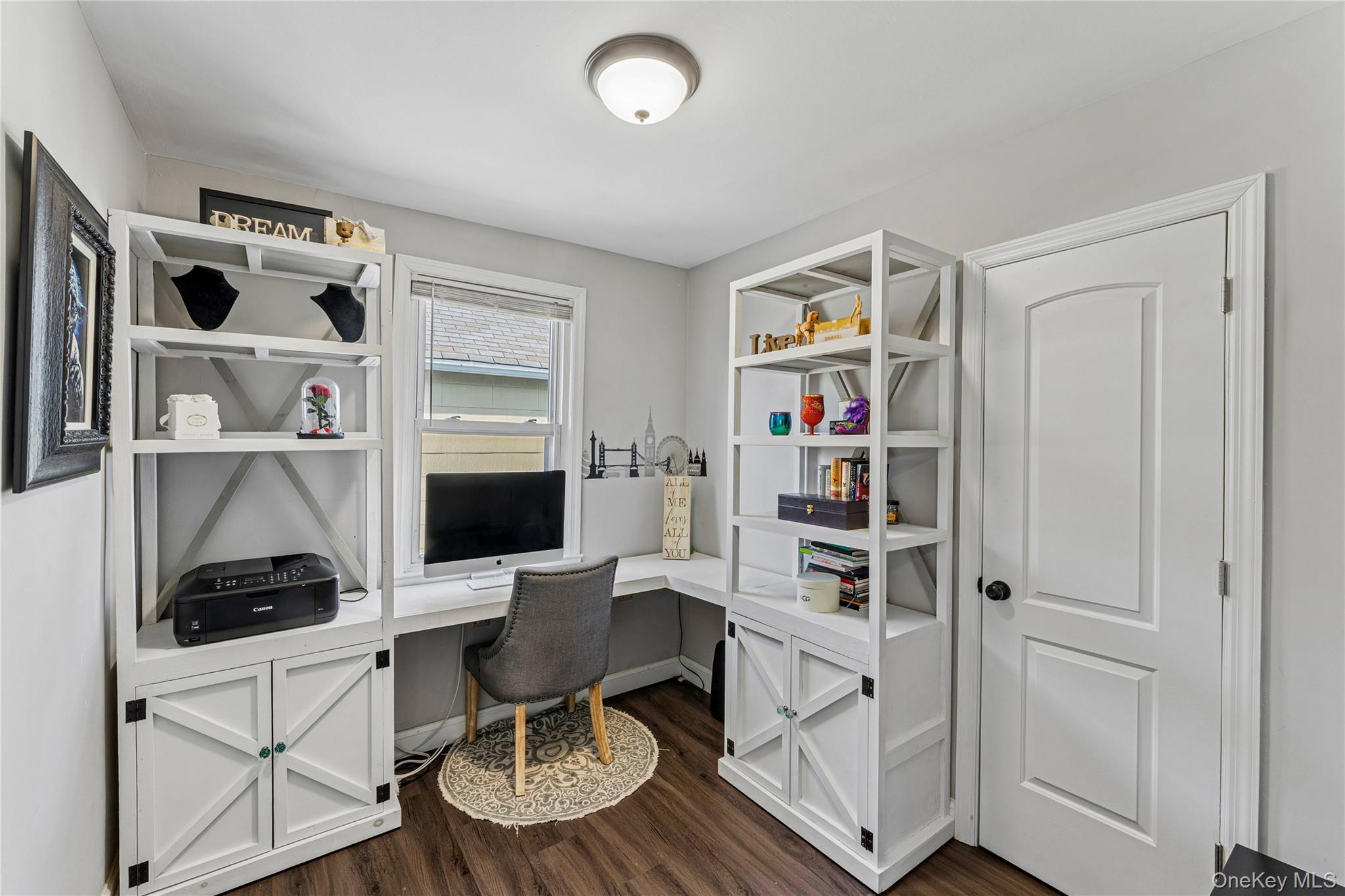 68 Putnam Avenue Valley Stream, NY 11580 - Photo 10 of 23 a workspace with furniture and white walls