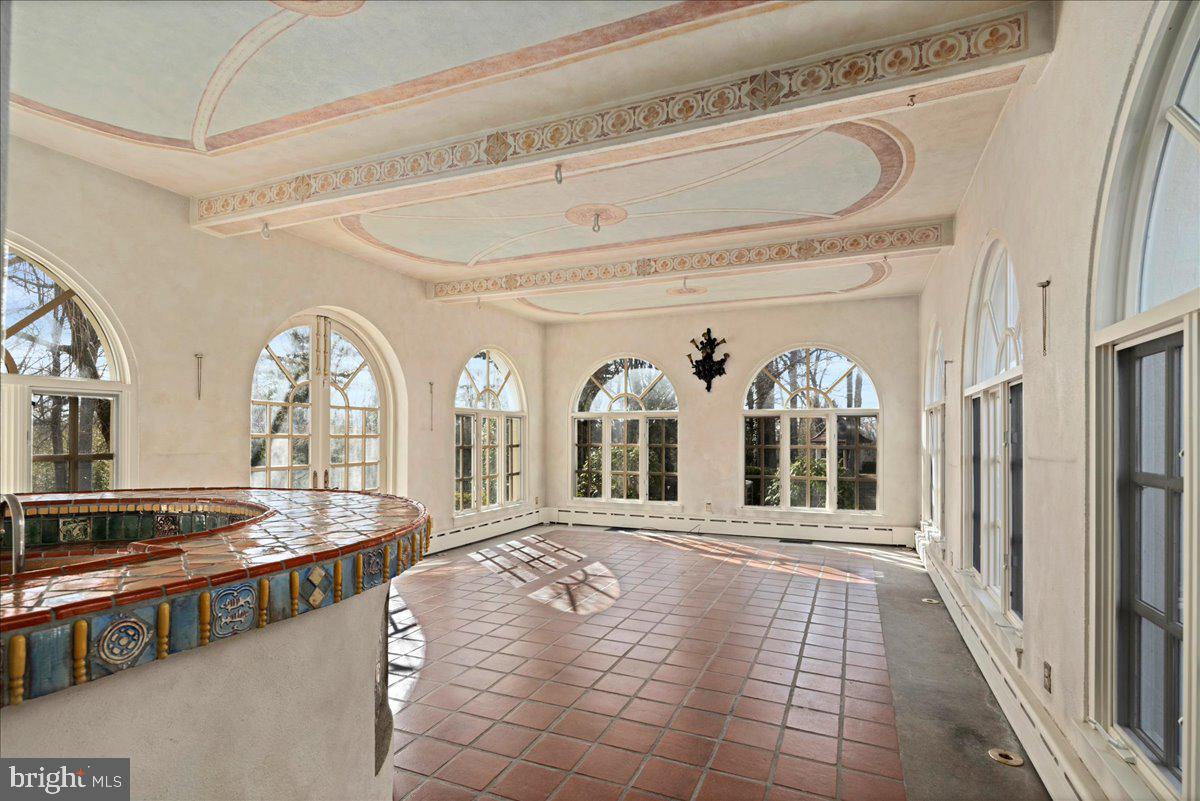 2185 South Easton Road Doylestown, PA 18901 - Photo 22 of 62 a lobby with furniture and a large window