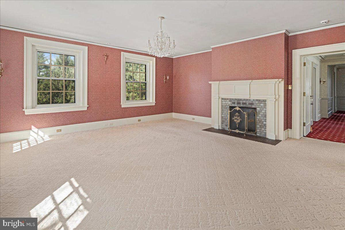 2185 South Easton Road Doylestown, PA 18901 - Photo 36 of 62 an empty room with windows and fireplace