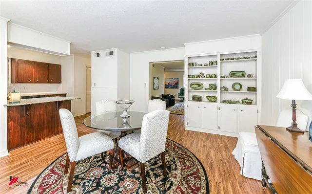 a view of a livingroom with furniture and wooden floor