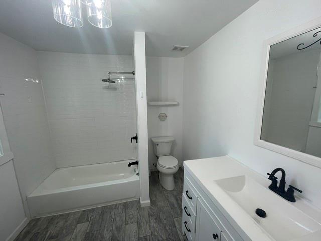 4495 Calhoun Road Northeast Rome, GA 30161 - Photo 10 of 14 a bathroom with a sink a toilet and shower