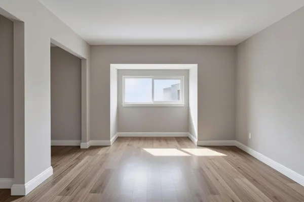 a bedroom with a bed and a potted plant