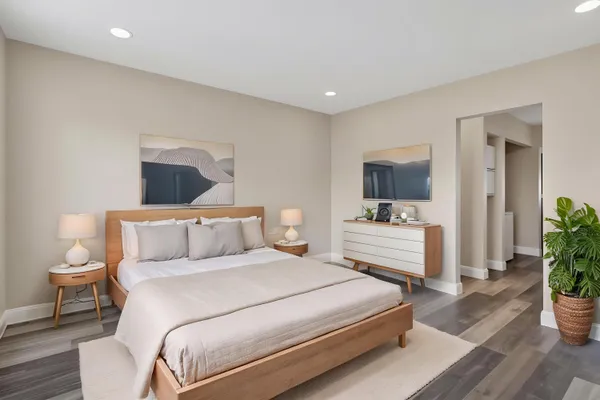 a view of room with wooden floor