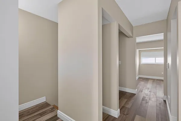a view of wooden fence of a house