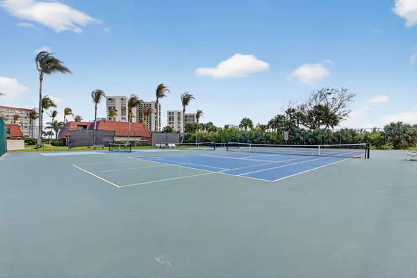 a view of a lake with a house and a ocean view