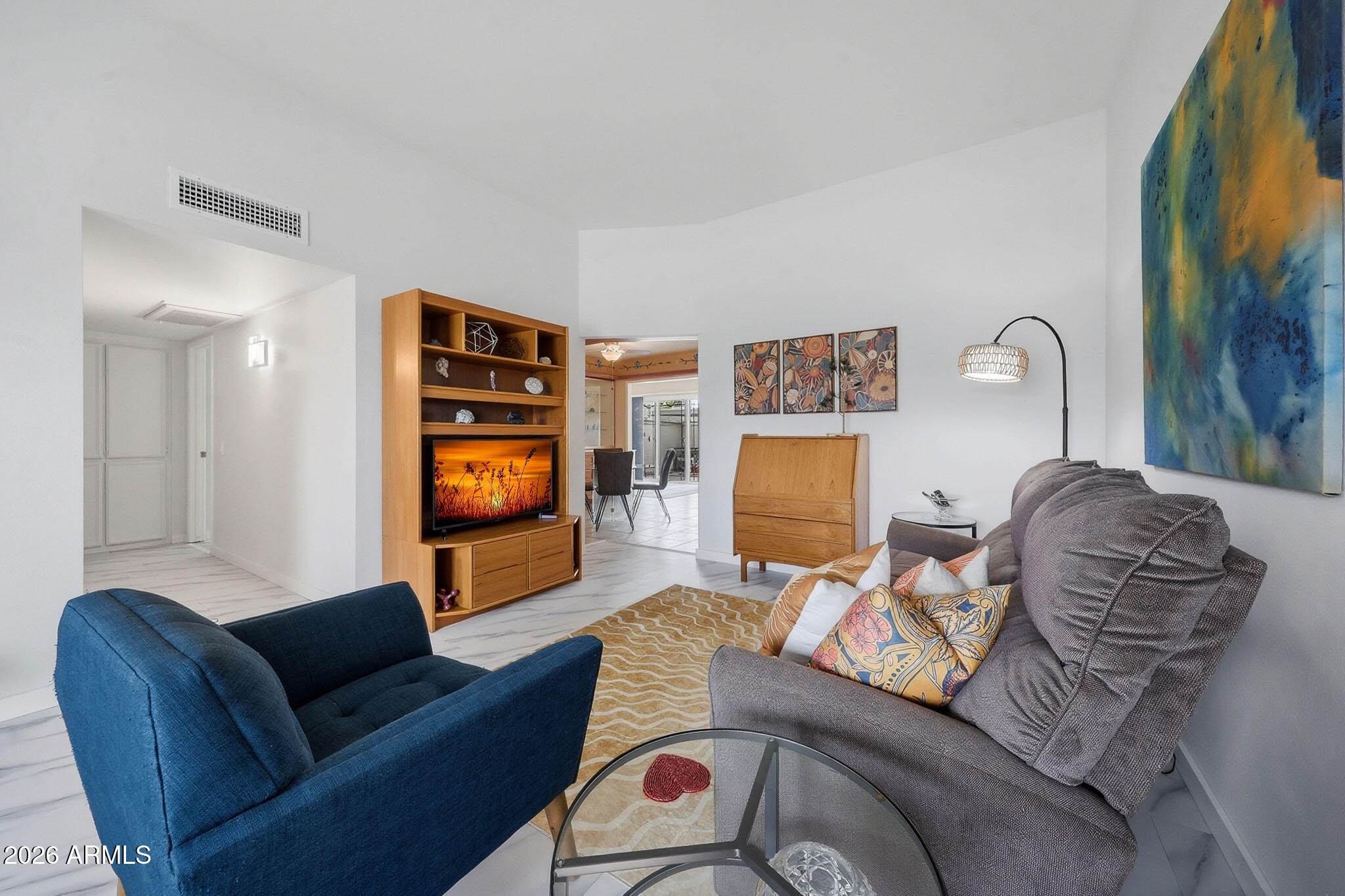 9970 West Royal Oak Road, Unit Q Sun City, AZ 85351 - Photo 16 of 38 a living room with furniture and a flat screen tv