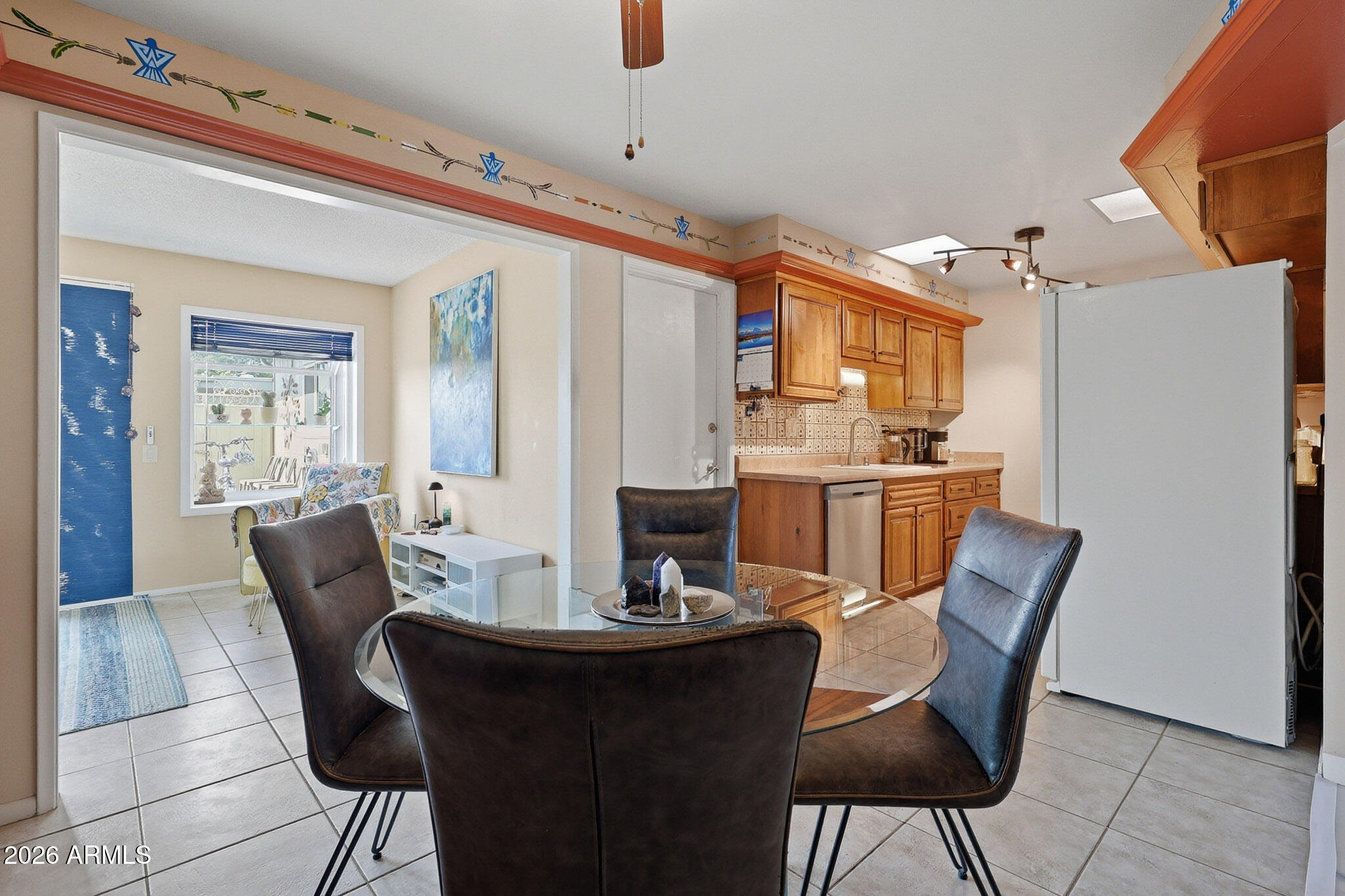 9970 West Royal Oak Road, Unit Q Sun City, AZ 85351 - Photo 5 of 38 a view of a dining room with furniture