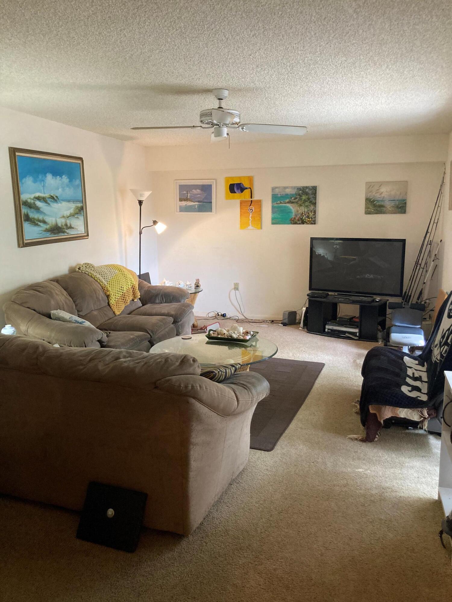 1525 15th Court Jupiter, FL 33477 - Photo 2 of 11 1525 15th ct living room 10,13,22