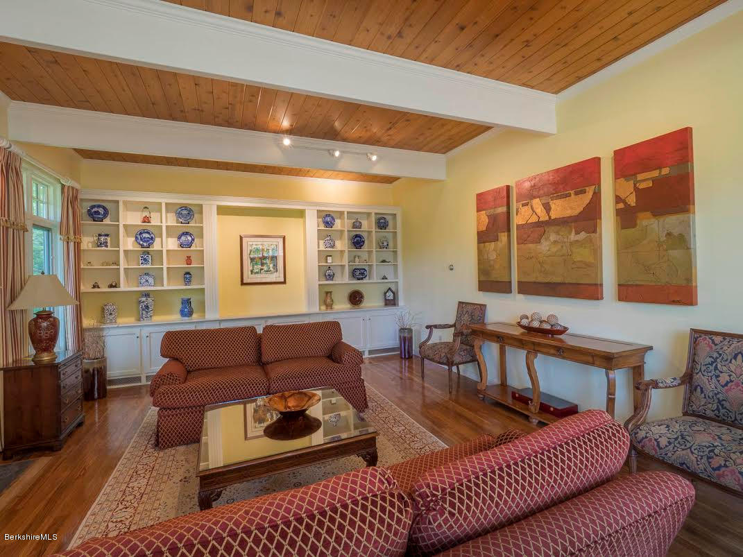 231 Sweet Brook Road Williamstown, MA 01267 - Photo 6 of 34 Living room with bookcases