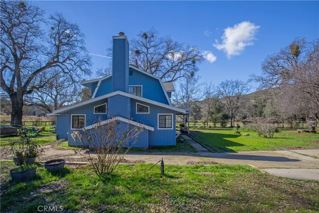 a house view with a garden space