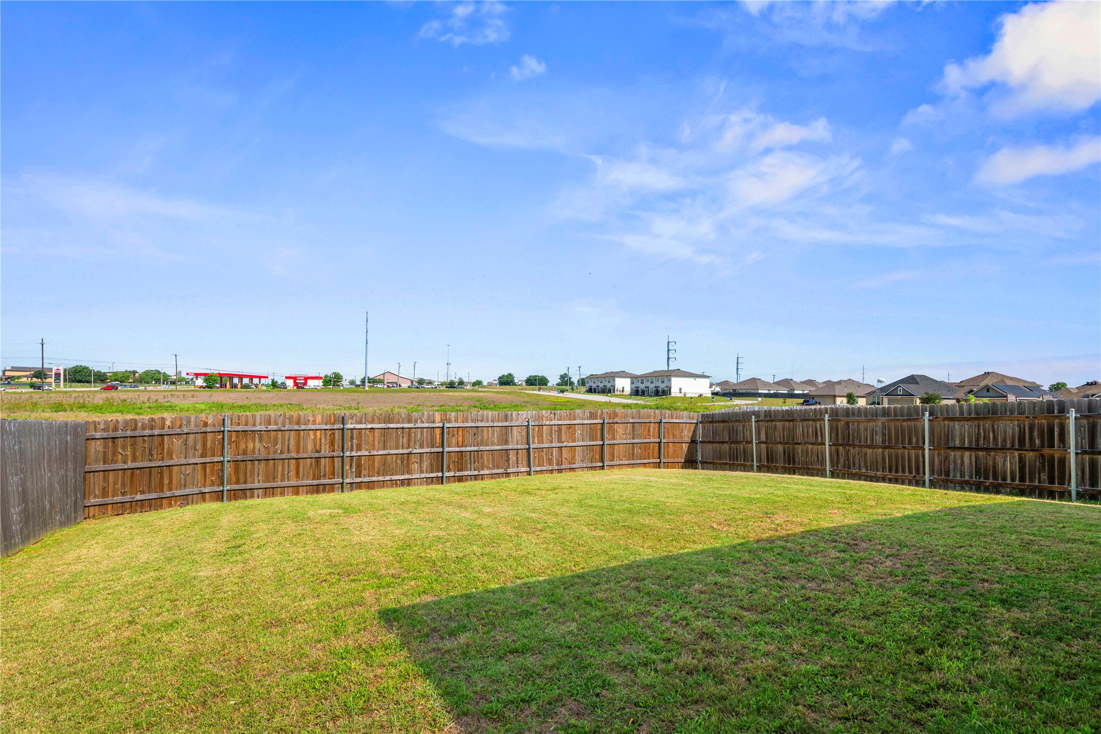 3018 Clevelander Drive Temple, TX 76504 - Photo 20 of 21 a view of a lake with a big yard and large trees
