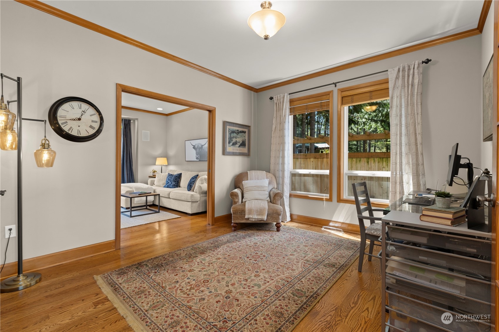 7805 Lake Alice Road Southeast Fall City, WA 98024 - Photo 15 of 32 a living room with furniture and a large window