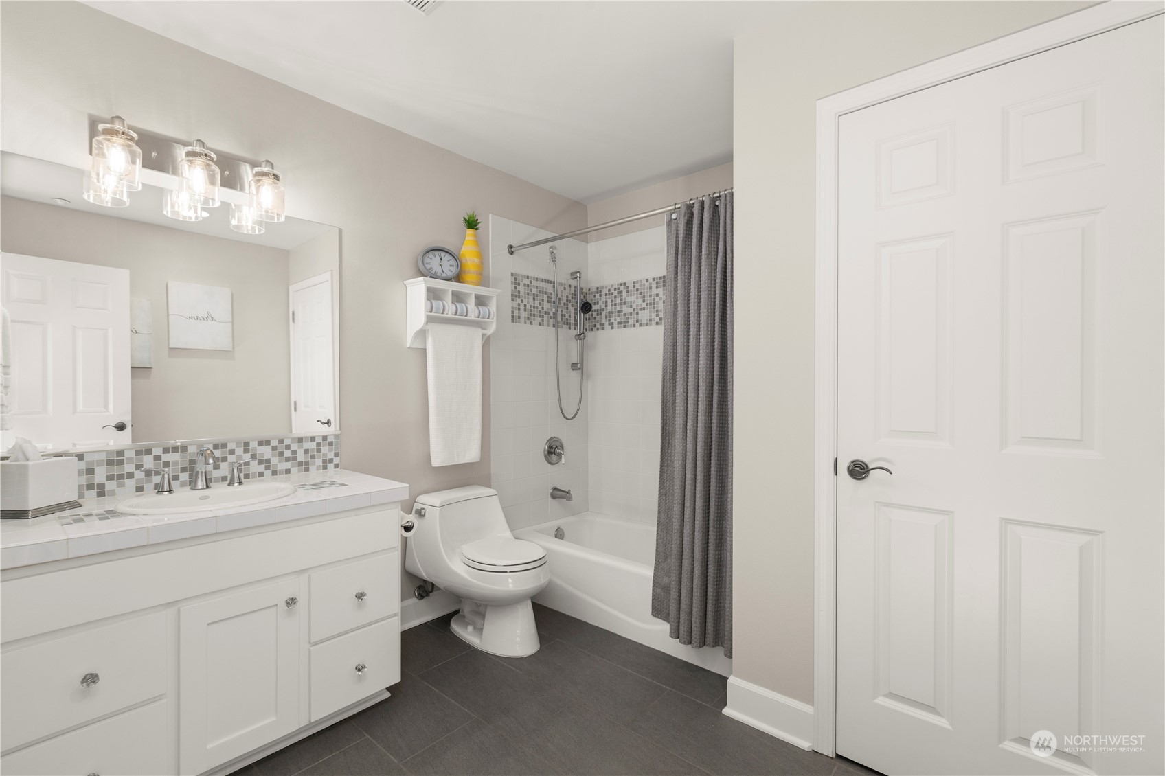 7805 Lake Alice Road Southeast Fall City, WA 98024 - Photo 21 of 32 a spacious bathroom with a double vanity sink a mirror and a toilet