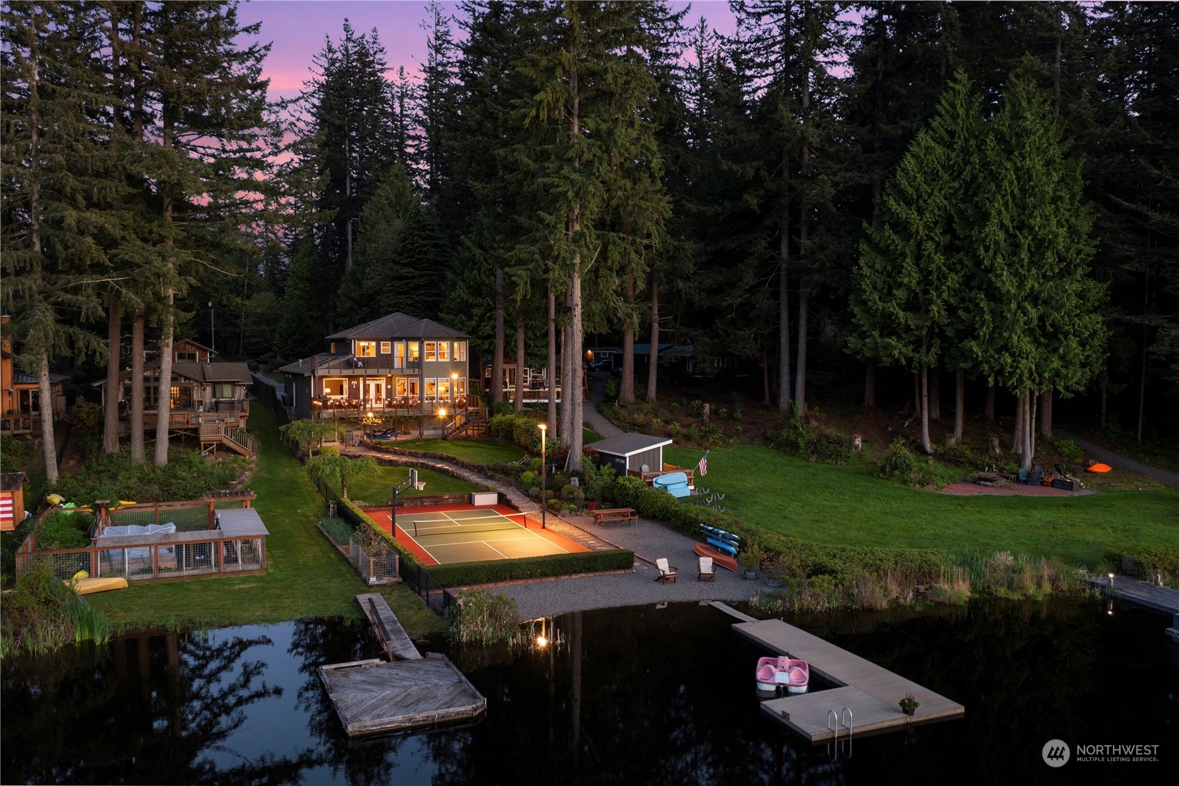 7805 Lake Alice Road Southeast Fall City, WA 98024 - Photo 27 of 32 a view of a chairs and table in backyard