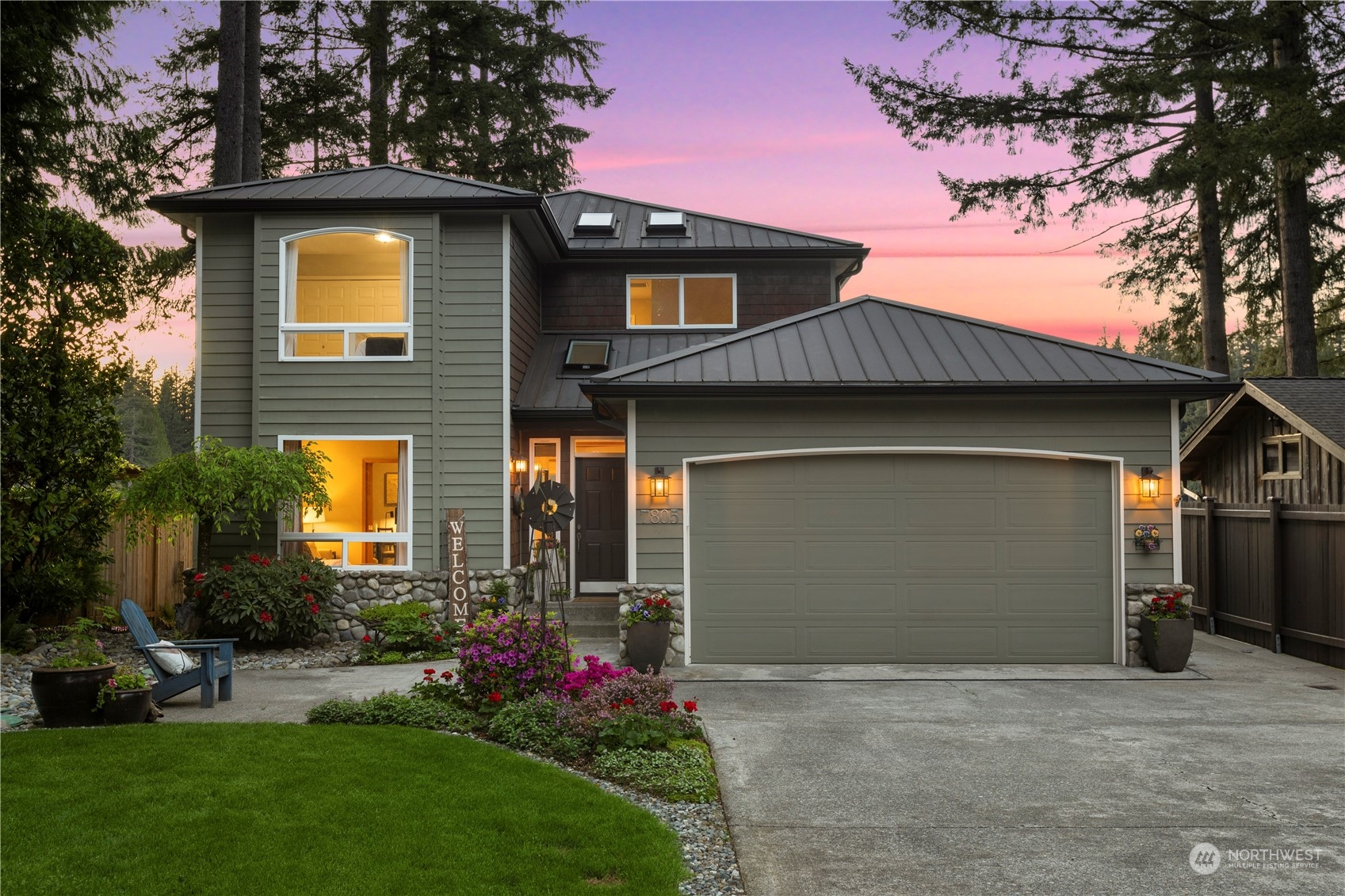 7805 Lake Alice Road Southeast Fall City, WA 98024 - Photo 31 of 32 a front view of a house with a garden