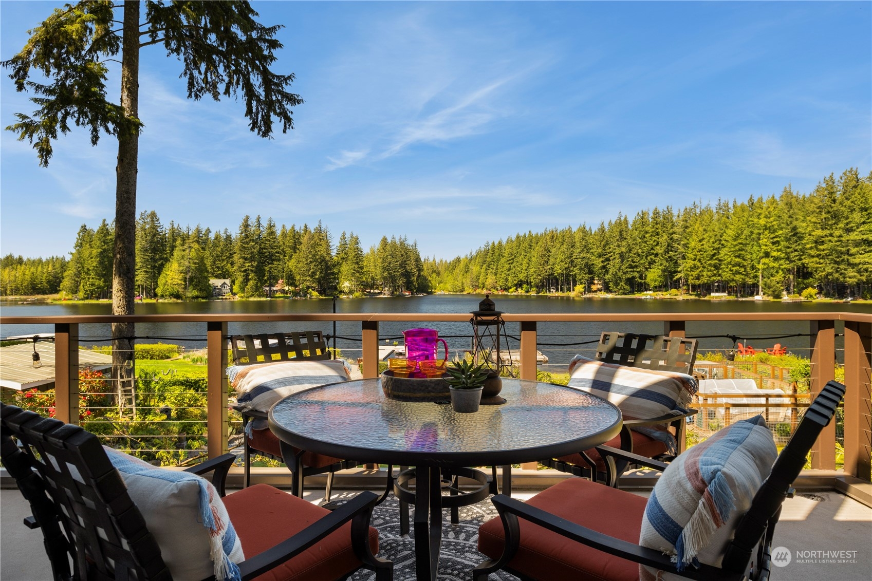 7805 Lake Alice Road Southeast Fall City, WA 98024 - Photo 7 of 32 a view of a chairs and table in patio