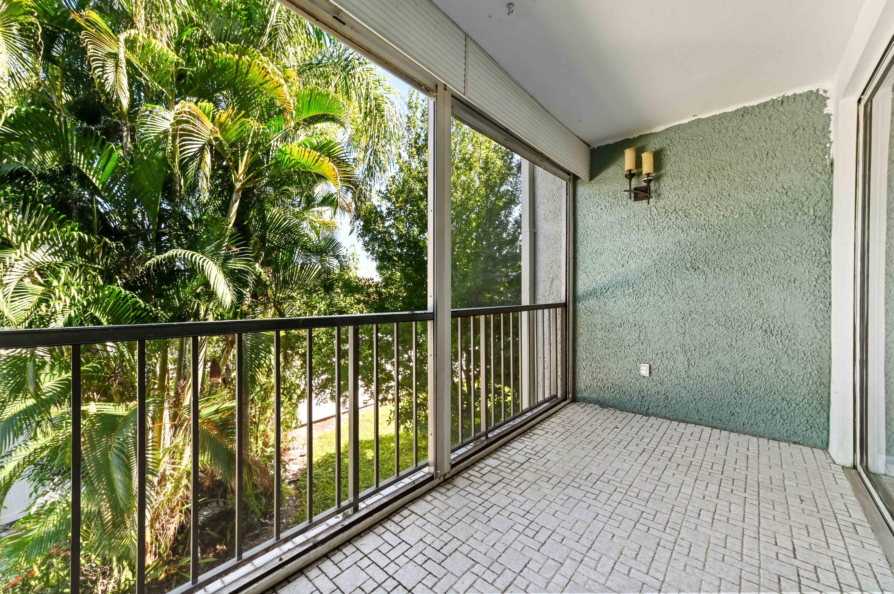4080 Tivoli Court, Unit 202 Lake Worth, FL 33467 - Photo 13 of 28 a view of a balcony with window