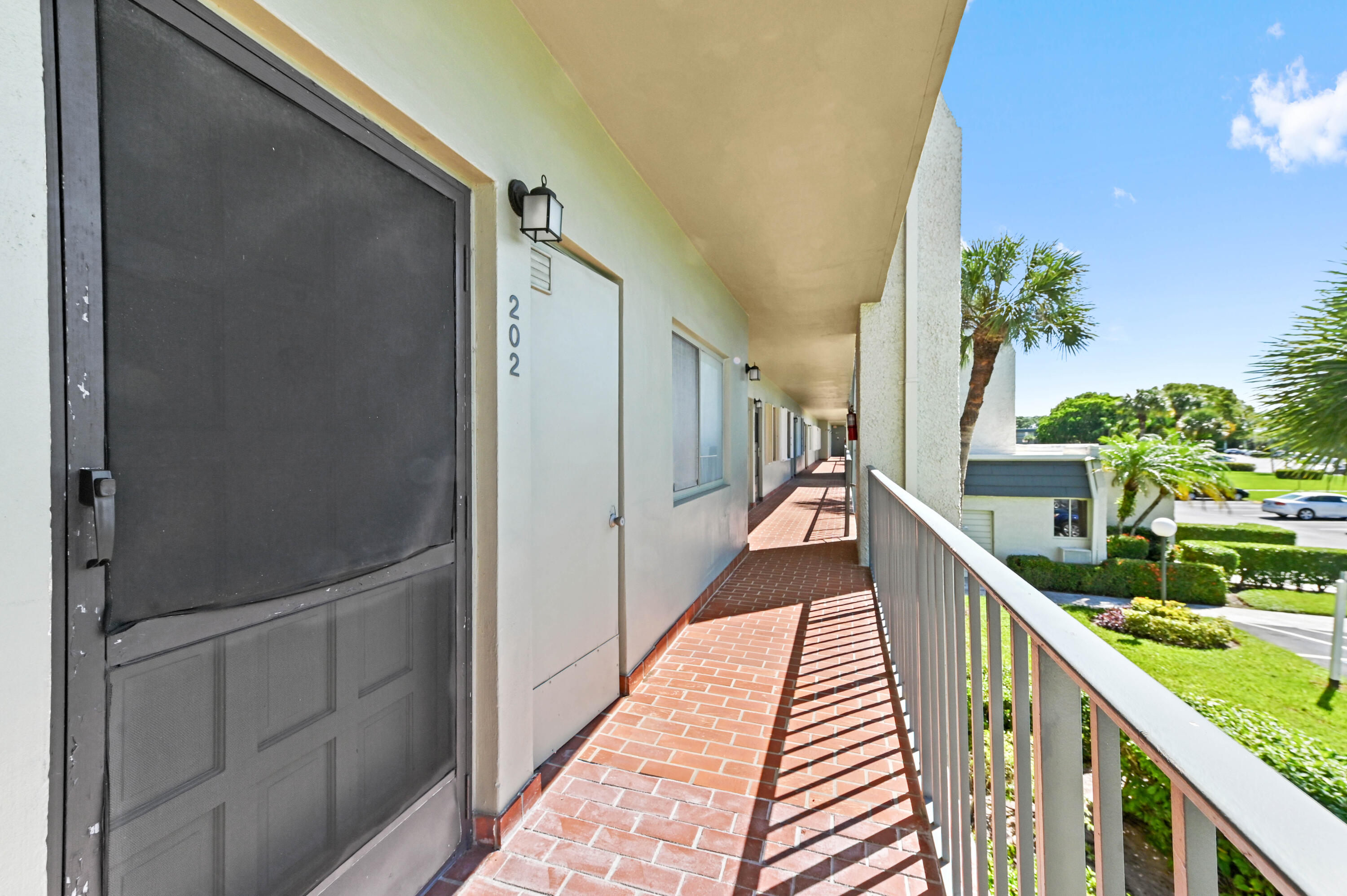 4080 Tivoli Court, Unit 202 Lake Worth, FL 33467 - Photo 26 of 28 a view of a balcony
