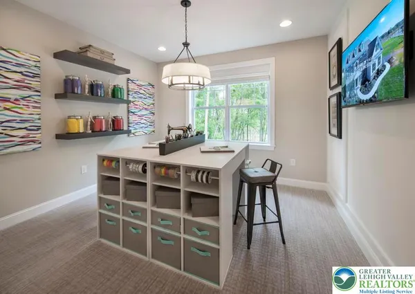 a kitchen with a stove a sink and a microwave