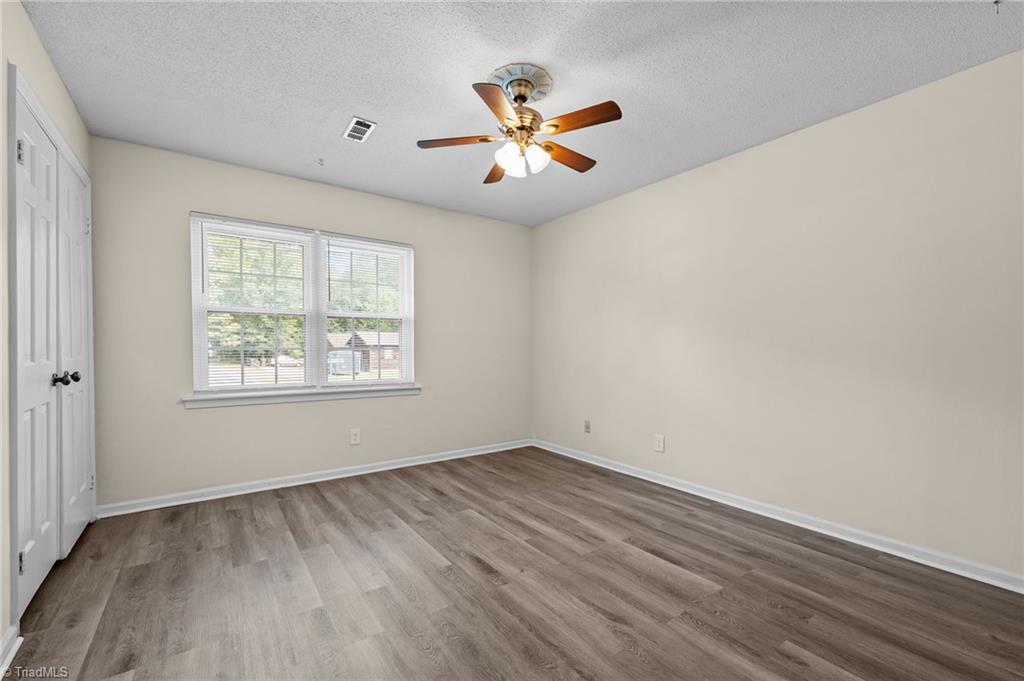 1315 West Meadowview Road, Unit G Greensboro, NC 27403 - Photo 12 of 17 PRIMAREY BEDROOM
