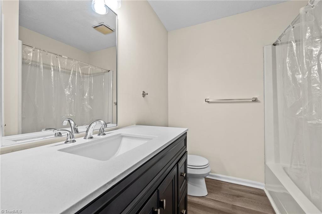 1315 West Meadowview Road, Unit G Greensboro, NC 27403 - Photo 14 of 17 FULL UPPER LEVEL BATHROOM