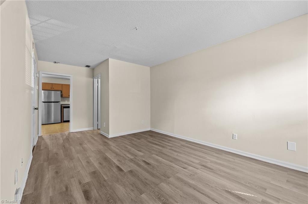 1315 West Meadowview Road, Unit G Greensboro, NC 27403 - Photo 2 of 17 GREAT ROOM