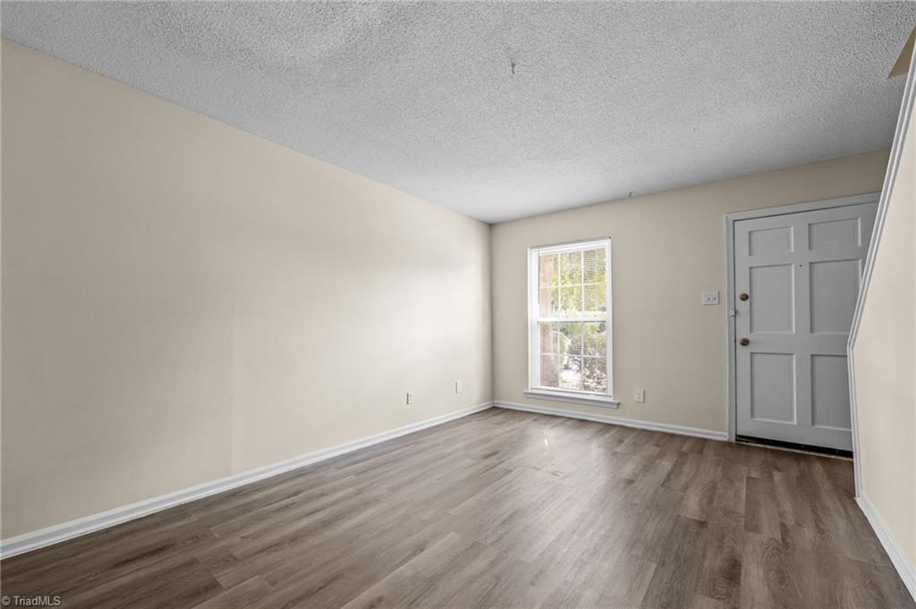 1315 West Meadowview Road, Unit G Greensboro, NC 27403 - Photo 8 of 17 GREAT ROOM