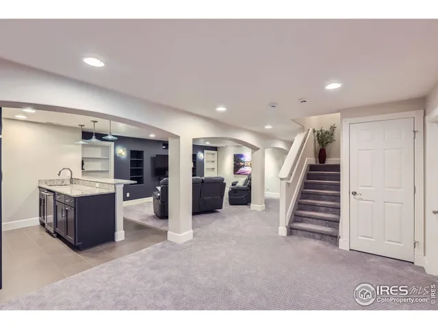 a view of a big room with staircase staircase and kitchen view