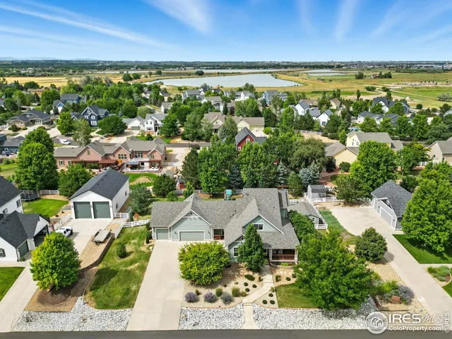 an aerial view of a house with a garden