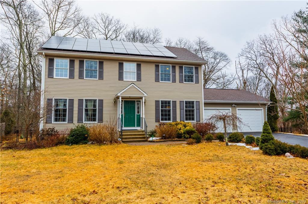 4 North Lee Road East Lyme, CT 06357 - Photo 1 of 1 a front view of a house with yard