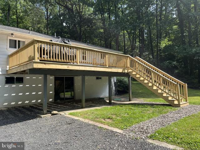 1663 Sawmill Road Spring City, PA 19475 - Photo 23 of 26 Deck steps to yard and driveway parking
