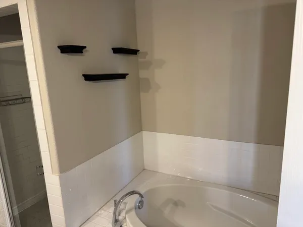 a bathroom with a bathtub