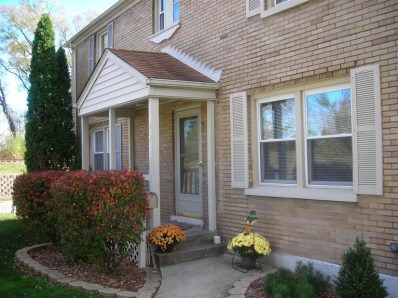 324 Beacon Place Munster, IN 46321 - Photo 3 of 10 a front view of a house with outdoor seating