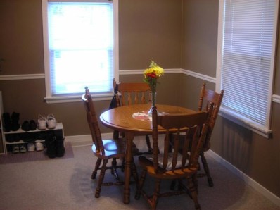 324 Beacon Place Munster, IN 46321 - Photo 6 of 10 a view of a dining room with furniture and window